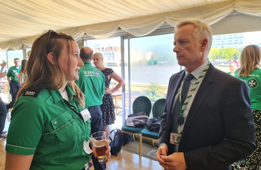 Rob Butler MP talks with a St John Ambulance Volunteer
